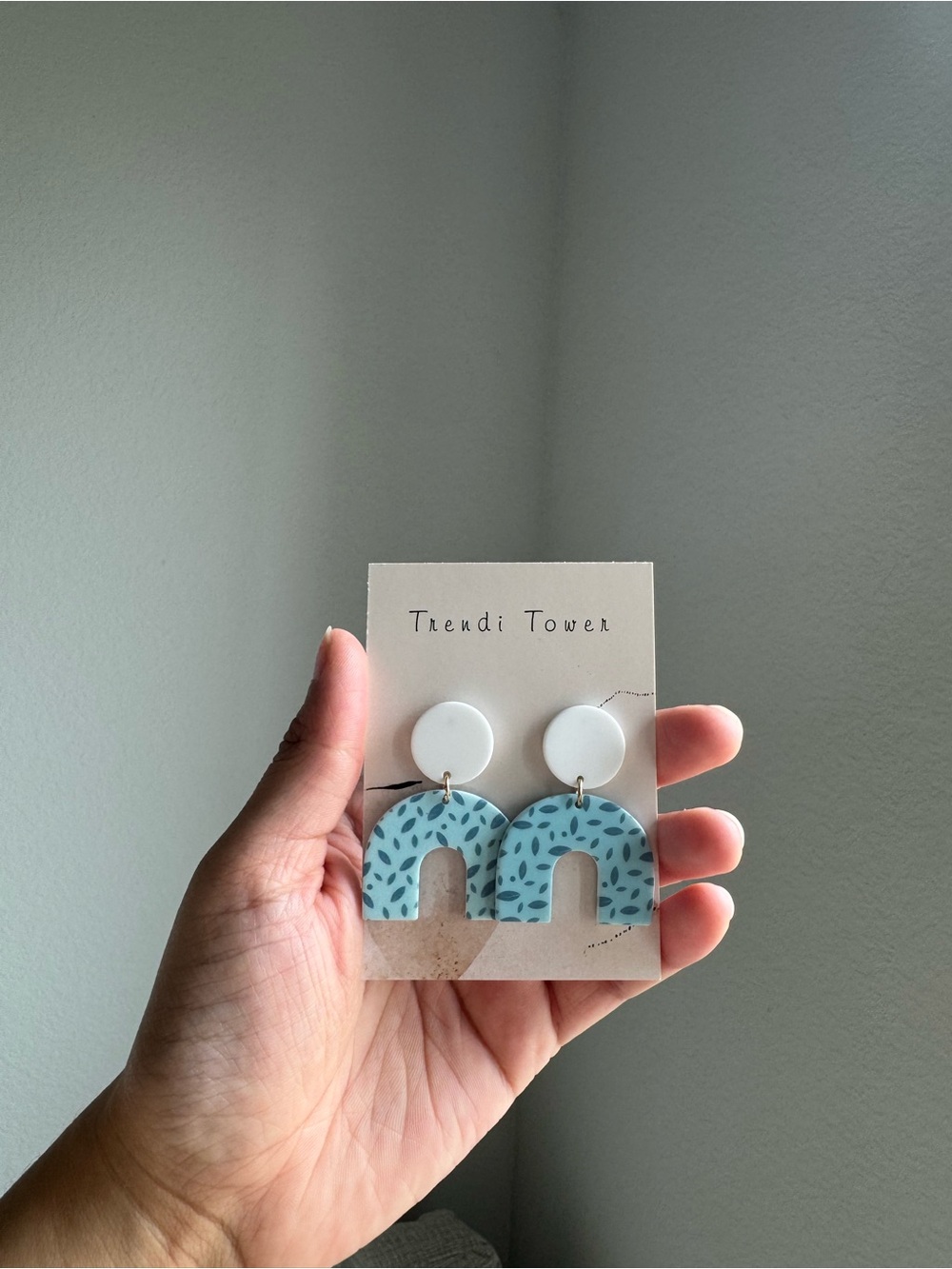 Trendi Tower Blue Leaf Arch Dangle Earrings